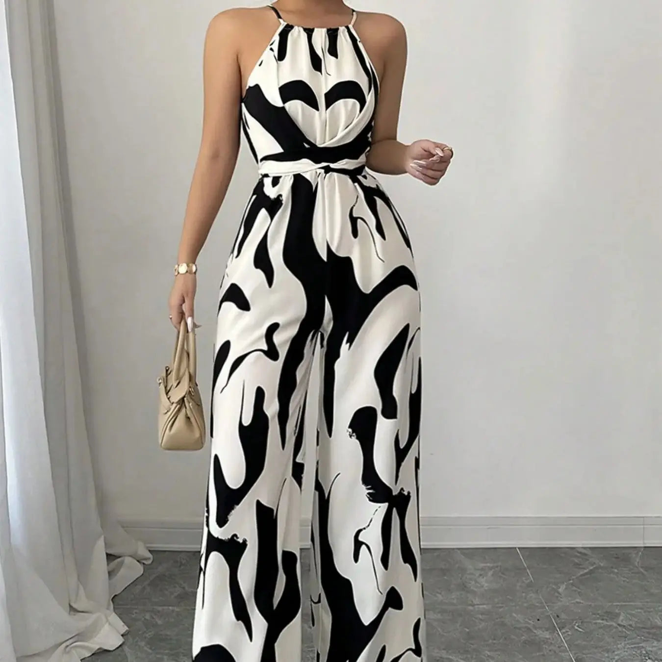 Women High end summer new retro versatile lace up waist slimming printed hanging neck jumpsuit